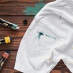 get acrylic paint out of clothes​